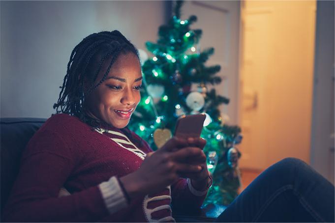 A person checking Informed Delivery preview email on a smartphone.